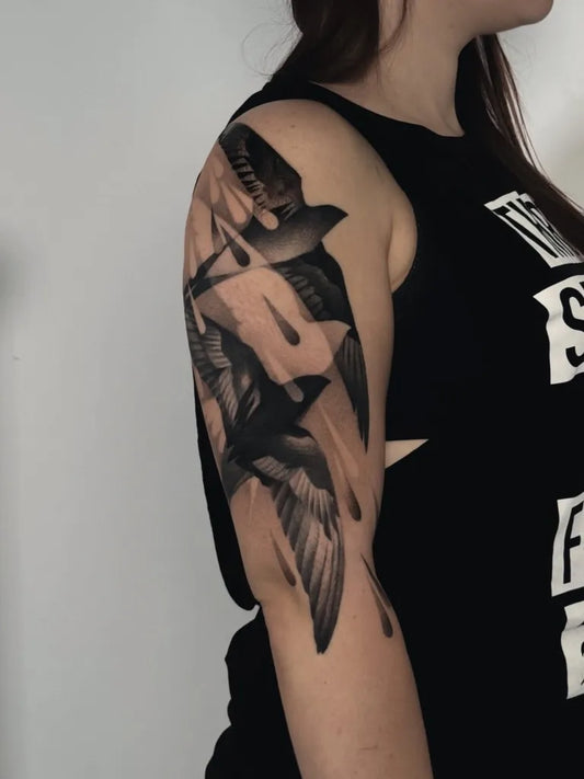 Big Black and Grey Swallows Tattoo on Women Arm by @michalina_bolach