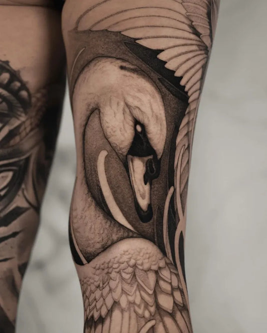 Big Black and Grey Swan Tattoo on Women Thigh by @evitas.atelier