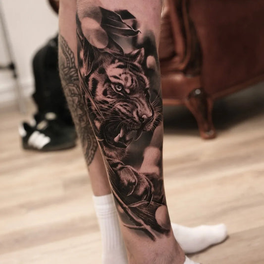 Big Black and Grey Tiger on Men Leg Tattoo by @kiyoharu_tattooer