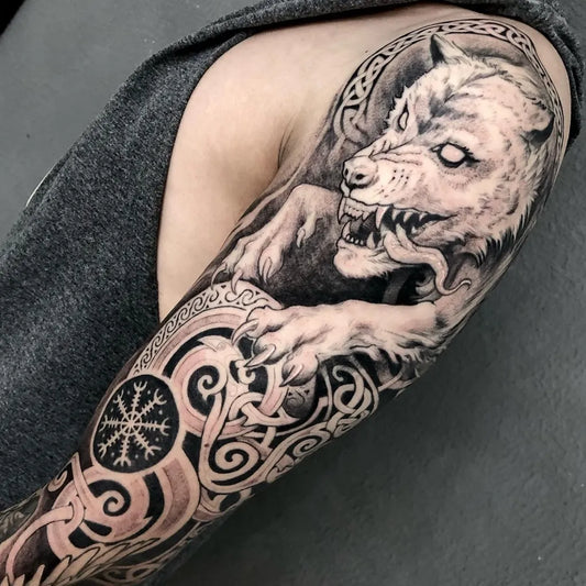 Big Black and Grey Vegvisir Fenrir Wolf Tattoo on Men Arm by @tiagooliveira.tattoo_