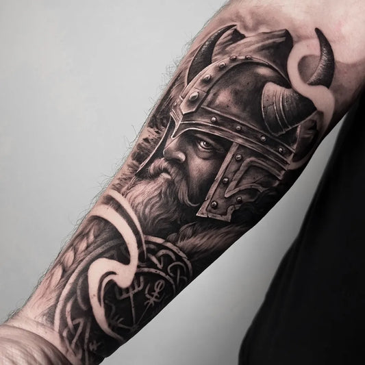Big Black and Grey Vegvisir Viking Warrior Tattoo on Men Arm by @inesvital.tattoo