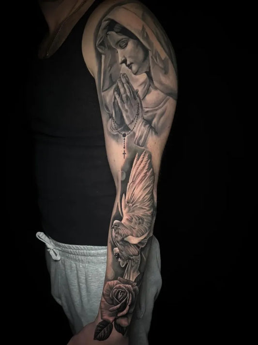 Big Black and Grey Virgin Mary Dove Rose Tattoo on Men Arm by @giannaneutron_tattoo