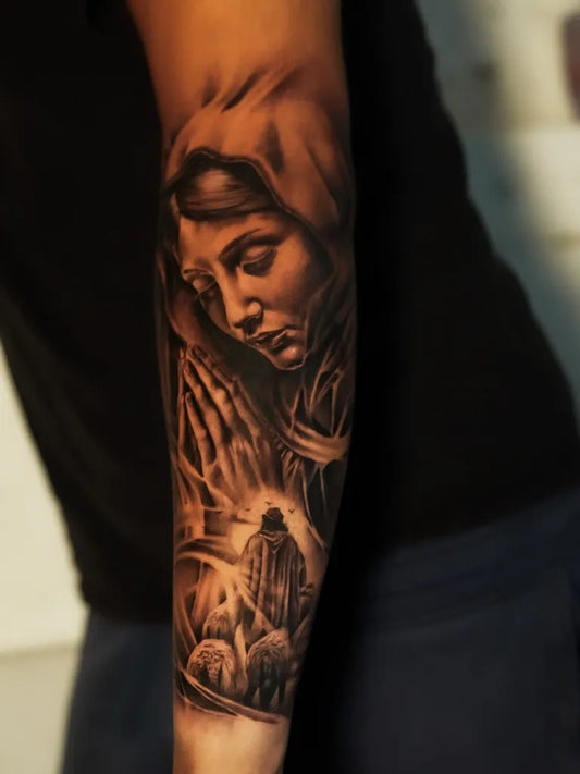 Big Black and Grey Virgin Mary Shepherd and Sheep Tattoo on Men Arm by @kjtattz