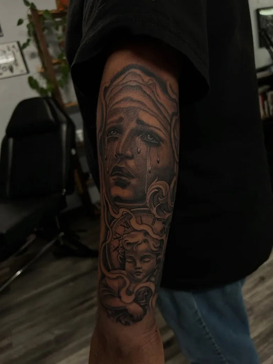 Big Black and Grey Virgin Mary with Medusa Tattoo on Men Arm by @inkbyjayj