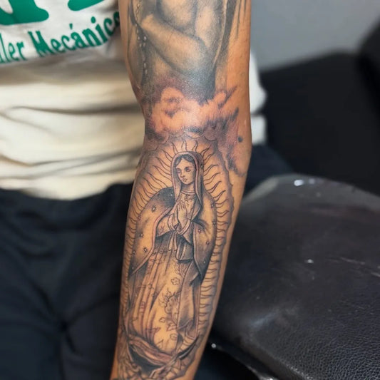 Big Black and Grey Virgin Mary with Rosary and Clouds Tattoo on Men Arm by @genuine_inks