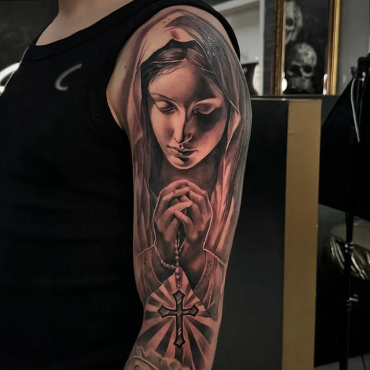 Big Black and Grey Virgin Mary with Rosary and Cross Tattoo on Women Arm by @zinoviev_tattoo