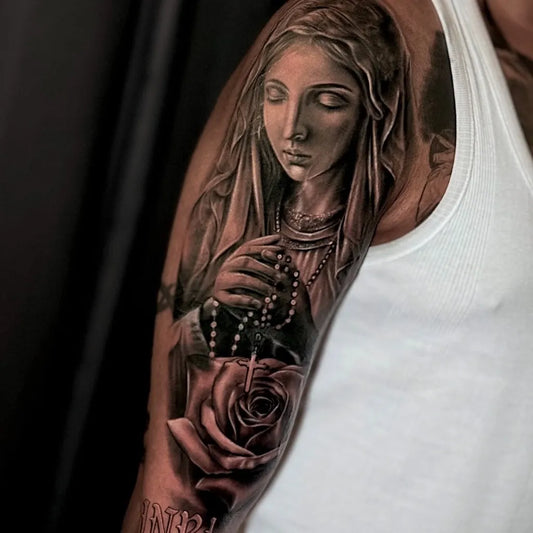 Big Black and Grey Virgin Mary with Rosary and Rose Tattoo on Men Arm by @ng.ringvean