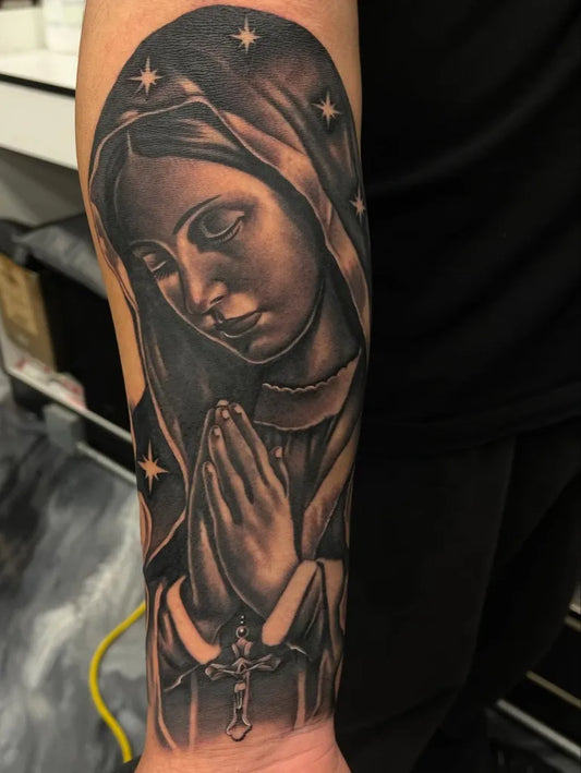 Big Black and Grey Virgin Mary with Rosary and Stars Tattoo on Men Arm by @angelboy_inks