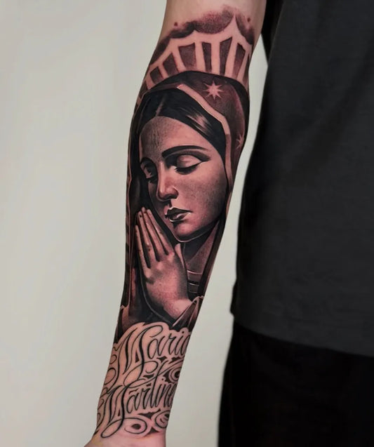 Big Black and Grey Virgin Mary with Rosary and Text Tattoo on Men Arm by @adrian_lazaro