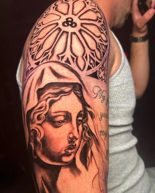 Big Black and Grey Virgin Mary with Rose Window Tattoo on Men Shoulder by @qwuincy