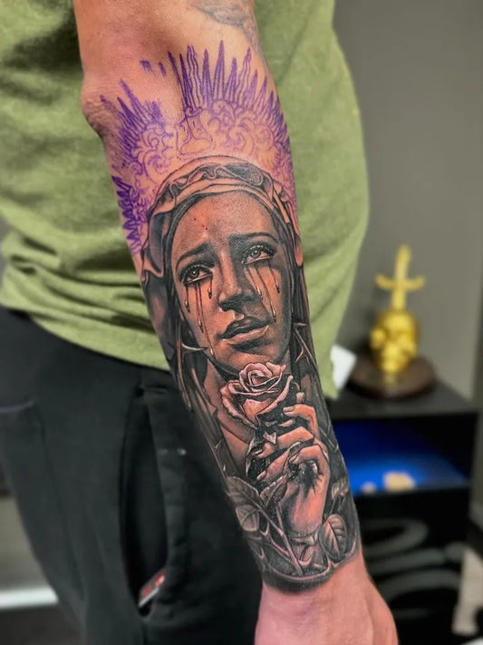 Big Black and Grey Virgin Mary with Rose and Wings Tattoo on Men Arm by @mtghadban.ink
