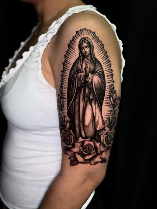 Big Black and Grey Virgin Mary with Roses Tattoo on Women Arm by @cinthya_tattoos