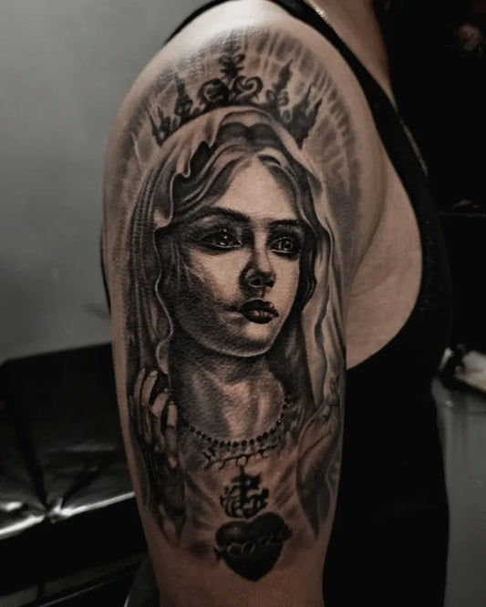 Big Black and Grey Virgin Mary with Sacred Heart Tattoo on Men Upper Arm by @murim.tattoo