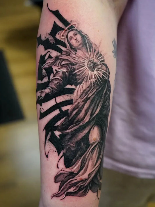 Big Black and Grey Virgin Mary with Sacred Heart and Flowing Robes Tattoo on Women Arm by @unborrowedvision