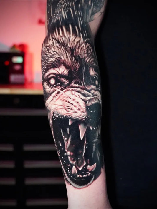 Big Black and Grey Wolf Head on Men Arm Tattoo by @josk_tattoo