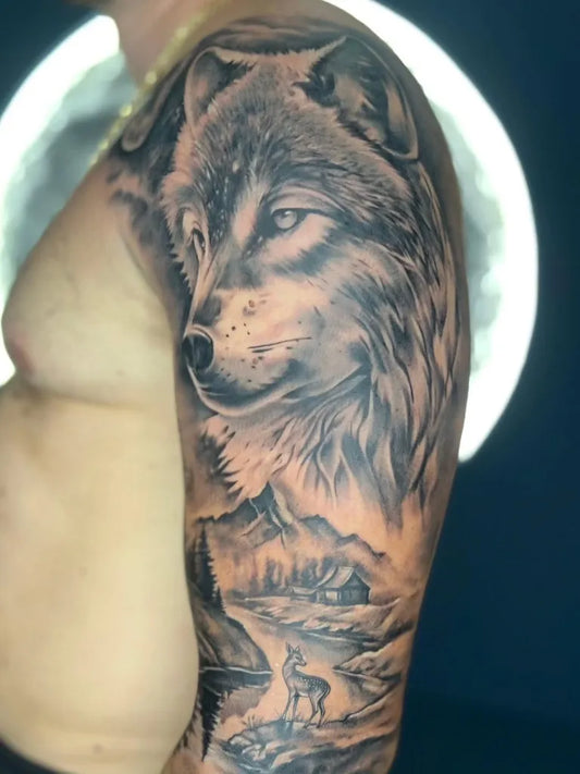 Big Black and Grey Wolf Landscape Deer on Men Arm Tattoo by @tattoo.lorin