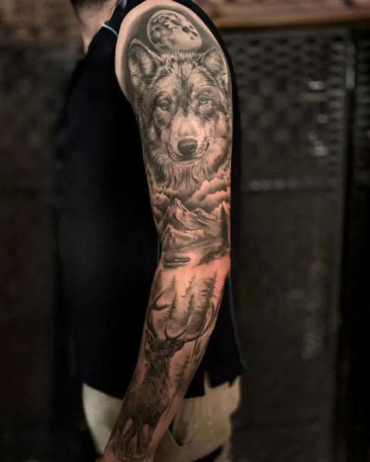 Big Black and Grey Wolf Moon and Mountains on Men Arm Tattoo by @ha_tattooist