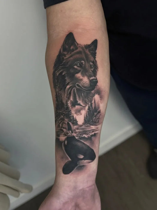 Big Black and Grey Wolf Orca Landscape on Men Arm Tattoo by @freecoastcompany