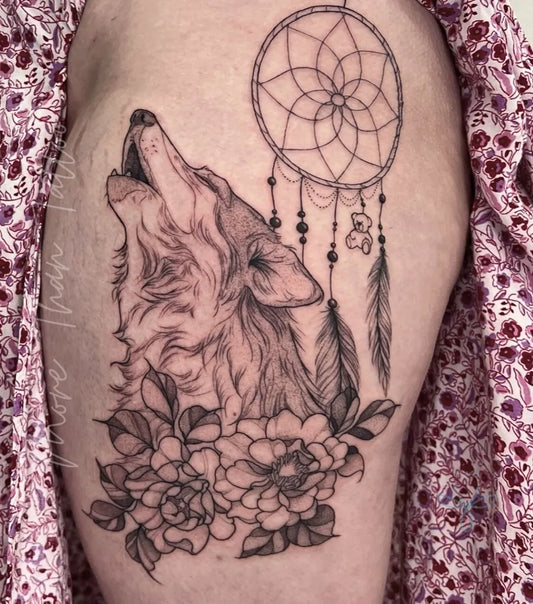 Big Black and Grey Wolf and Dreamcatcher on Women Thigh Tattoo by @morethantattoomelbourne