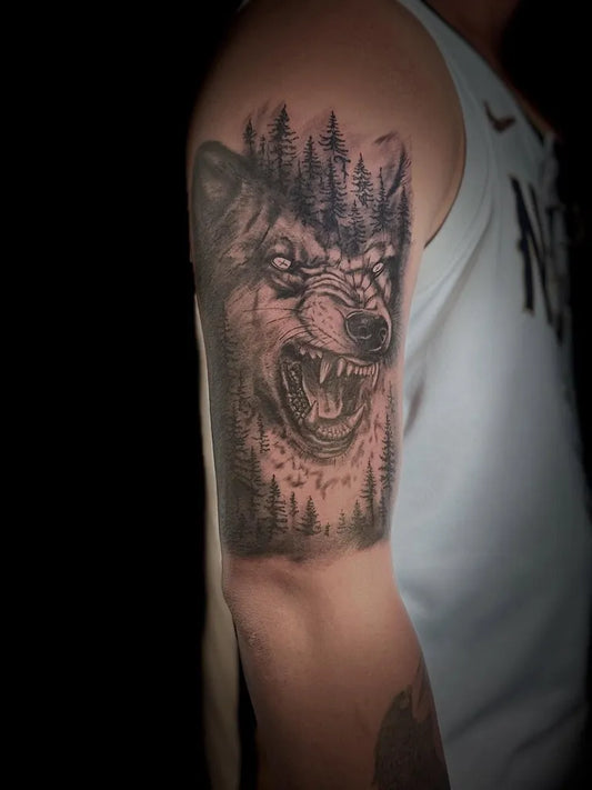 Big Black and Grey Wolf with Forest Men Arm Tattoo by @badmonkey_tattoo