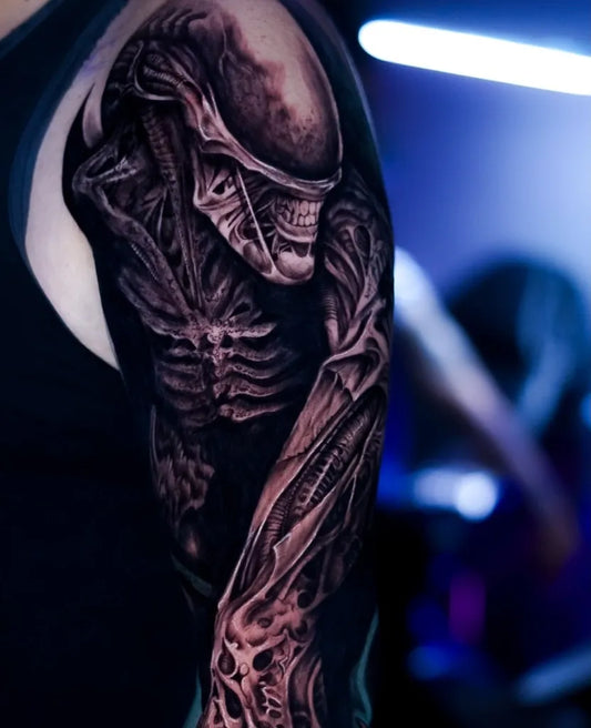 Big Blackwork Alien Tattoo on Men Arm by @danialvarado_tattoo