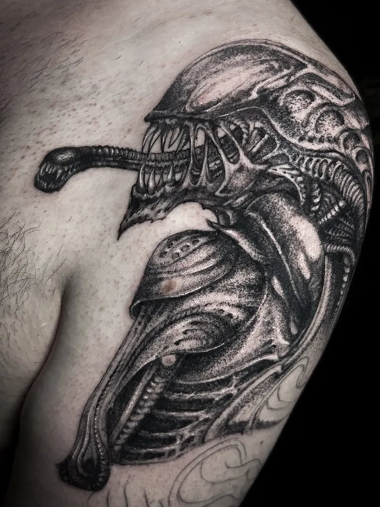 Big Blackwork Alien and Xenomorph Tattoo on Men Shoulder by @eisenxgrind