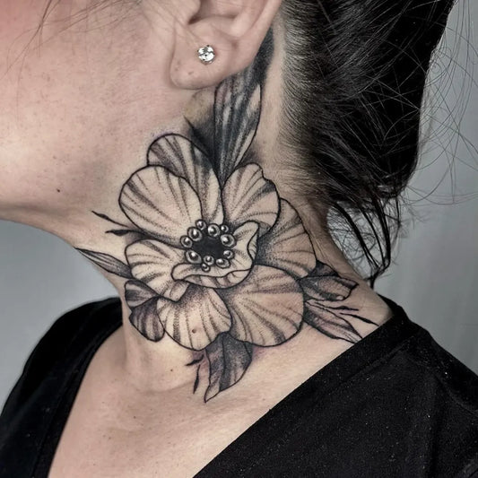 Big Blackwork Anemone Flower on Women Neck Tattoo by @bumbleknee_