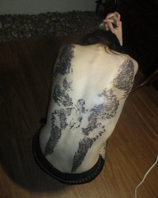 Big Blackwork Angel Wings Tattoo on Women Back by @sentimentalsound_