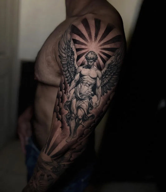 Big Blackwork Angel with Sun and Wings on Men Arm Tattoo by @c_franyutti