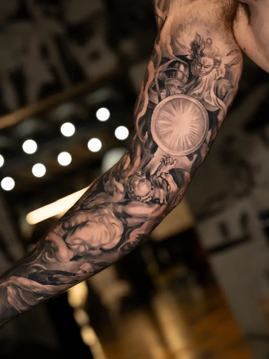 Big Blackwork Angels Shield on Men Arm Sleeve Tattoo by @mattiabretti
