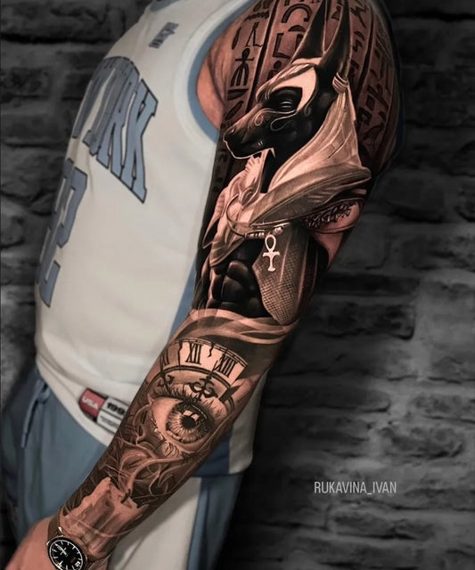 Big Blackwork Anubis Hieroglyphs Tattoo on Men Arm by @rukavina_ivan