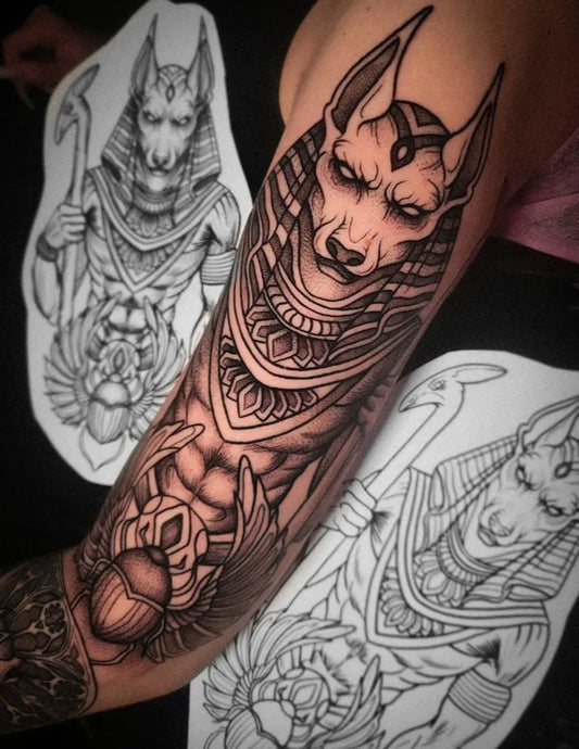 Big Blackwork Anubis Scarab Wings Tattoo on Men Arm by @mixia.ink