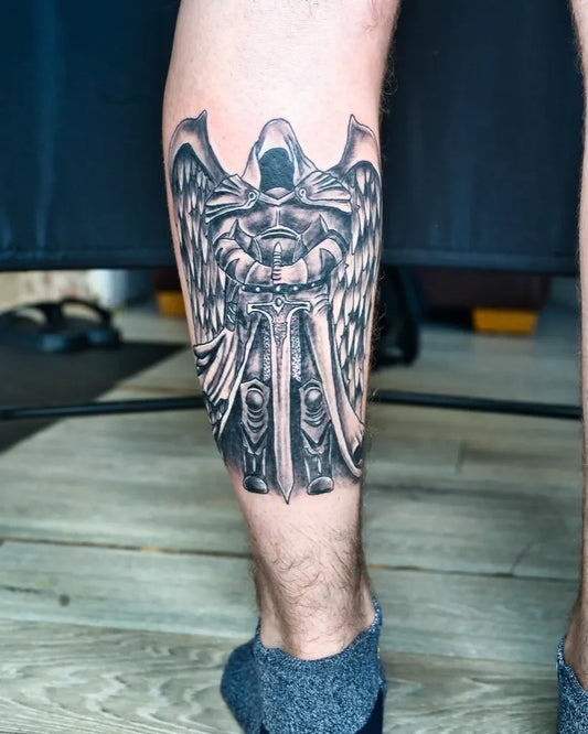 Big Blackwork Armored Angel Tattoo on Men Calf by @chapelhillstudio