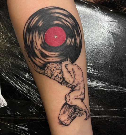 Big Blackwork Atlas Holding Vinyl Record Music Tattoo on Men Arm by @zetersenn_ink