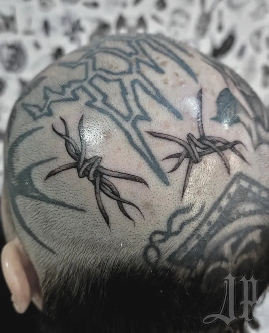 Big Blackwork Barbed Wire and Tribal Patterns Tattoo on Men Head by @jack_padointattoo