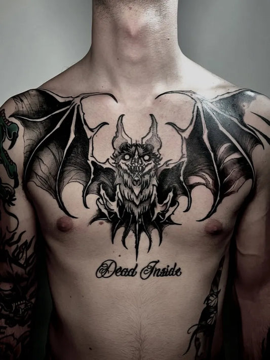 Big Blackwork Bat Tattoo on Men Chest by @luscheggia_tattooer