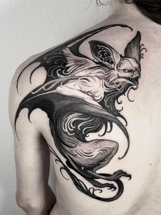 Big Blackwork Bat Tattoo on Women Shoulder by @miette_ttt