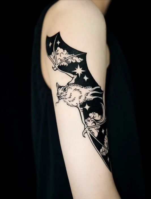 Big Blackwork Bat Wings Tattoo on Women Arm by @bloodmage_tattoo