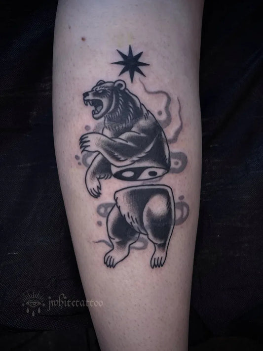 Big Blackwork Bear Cut Half on Women Leg Tattoo by @tomato.sorcery