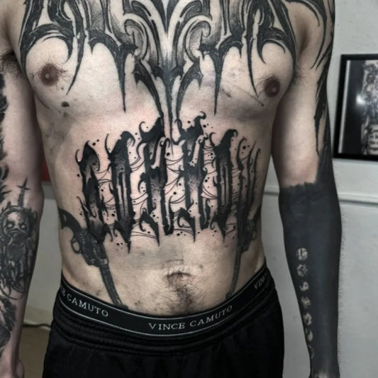 Big Blackwork Blackletter Tattoo on Men Stomach by @terrorlith