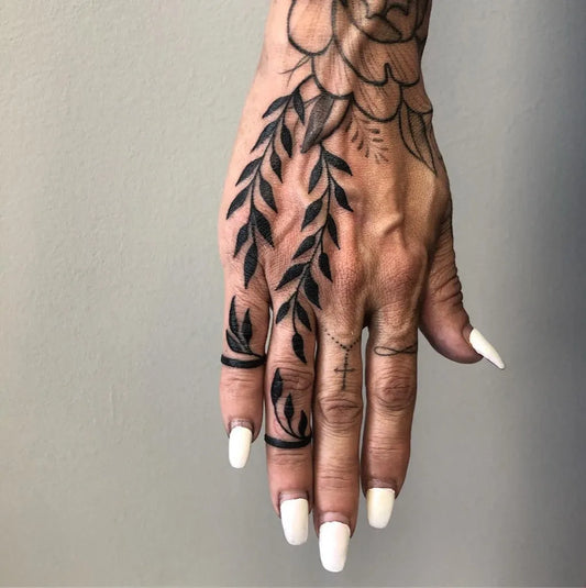 Big Blackwork Branches Cross on Women Hand Tattoo by @shannan.tattoos