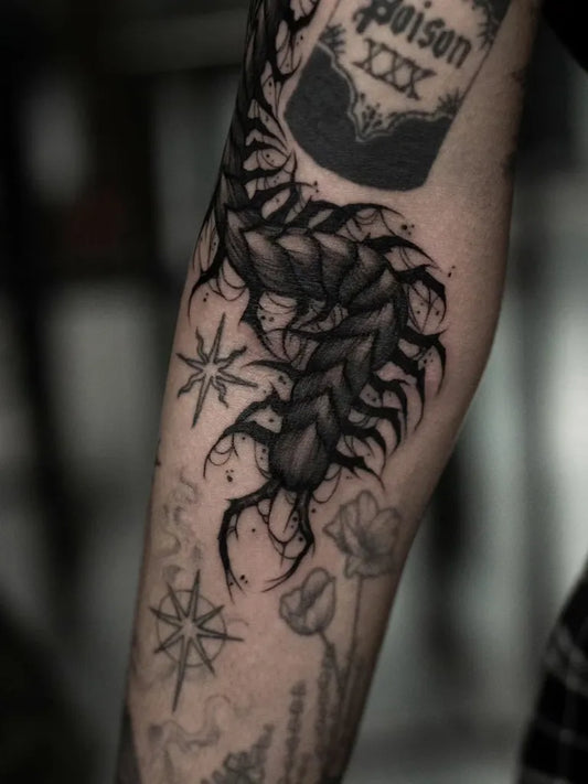 Big Blackwork Centipede Poison Bottle Tattoo on Men Arm by @saintthornstattoo
