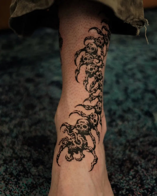 Big Blackwork Centipede Skulls Tattoo on Men Leg by @put.ink_