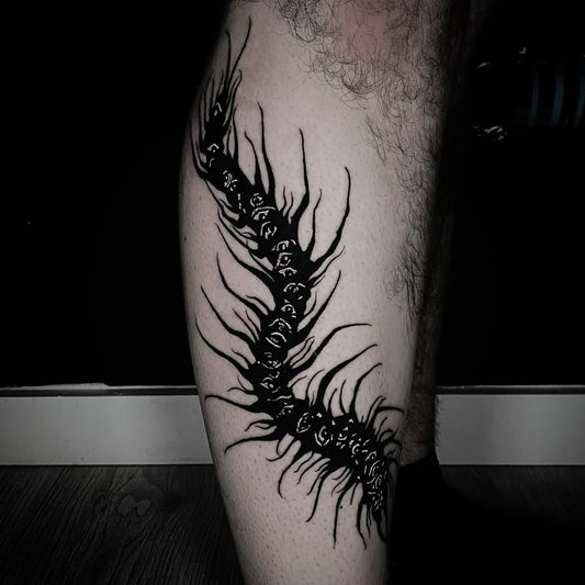 Big Blackwork Centipede Tattoo on Men Leg by @blackworkbenz