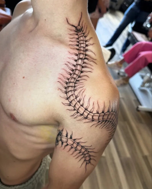 Big Blackwork Centipede Tattoo on Men Shoulder by @grs.tattoo