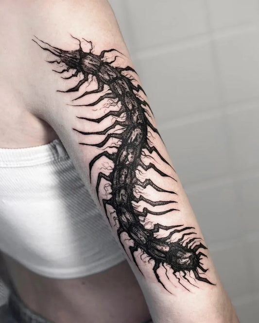 Big Blackwork Centipede Tattoo on Women Arm by @mickblackink