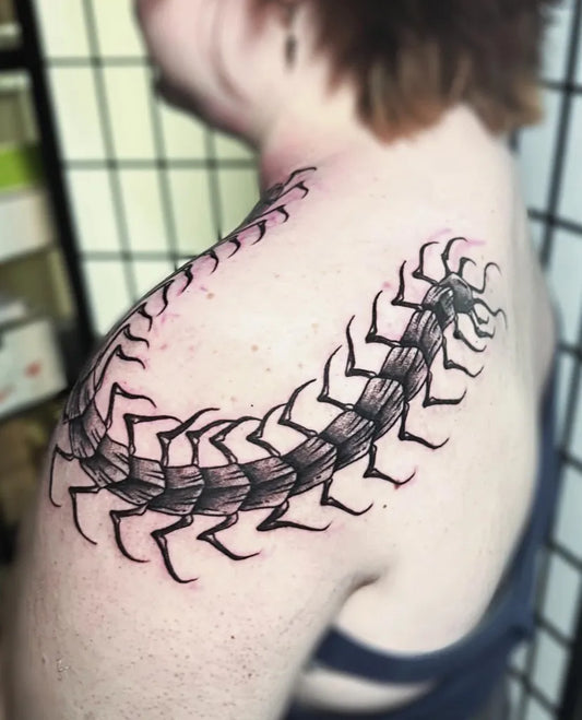 Big Blackwork Centipede Tattoo on Women Shoulder by @spookycreature.art