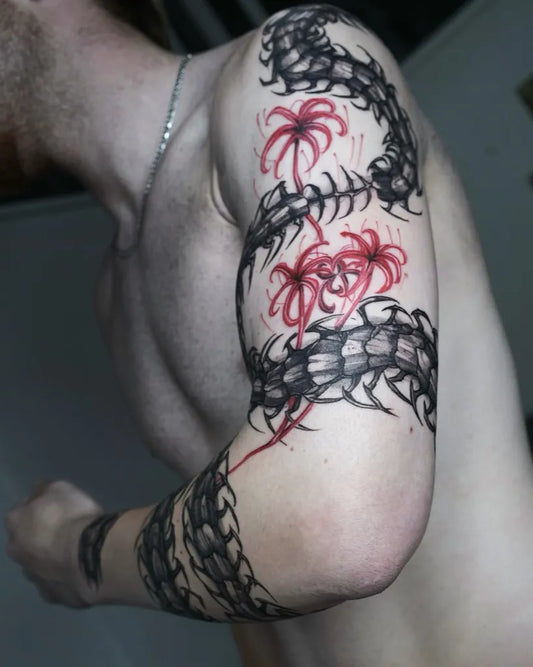 Big Blackwork Centipede and Red Flowers Tattoo on Men Arm by @gun_tattooist
