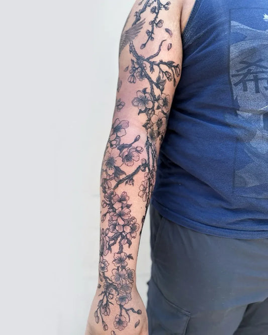 Big Blackwork Cherry Blossom Branches on Men Arm Sleeve Tattoo by @jiang_tattooer