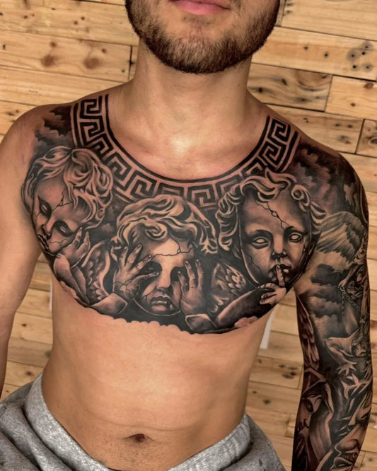 Big Blackwork Cherubs on Men Chest Tattoo by @newangelinkbali